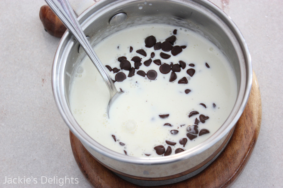 Heated heavy cream with chocolate chips, for the ganache 